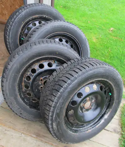 For Sale $350 Firm 4 Bridgestone Blizzak ws90 winter tires mounted on 5 x105 mm rims will fit chevy...