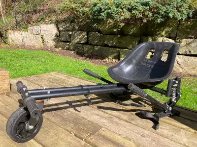 Attach this kart to your Hoverboard and turn it into a go kart! Sit in the seat and steer with hand...