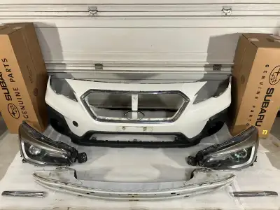 2019 Subaru Outback: Headlights, Bumper Cover, Bumper Support, and Chrome Accent Trim Pieces. This i...