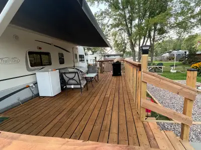 2004 30ft.Trail-Lite for sale! Shed, huge deck, patio furniture and bbq is included. Situated in a b...