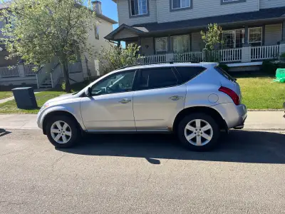 Selling a reliable and spacious 2007 Nissan Murano S AWD in silver. It has been a dependable daily d...