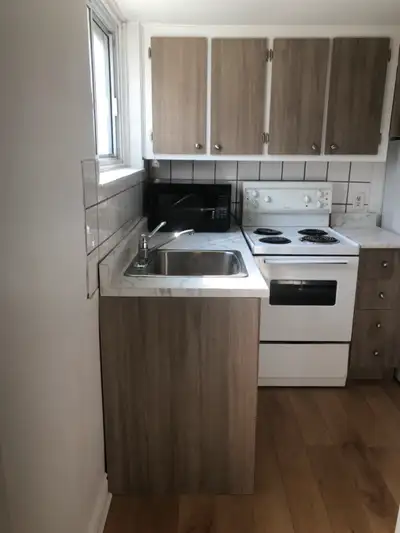 2 1/2 semi basement condo in ville saint-Laurent west