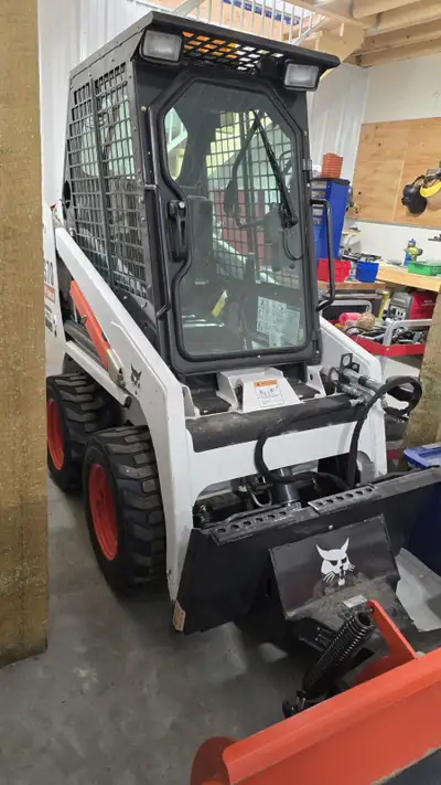 Please read entire ad. Up of sale is my 2012 Bobcat S70 skidsteer loader with only 231 hours. In exc...