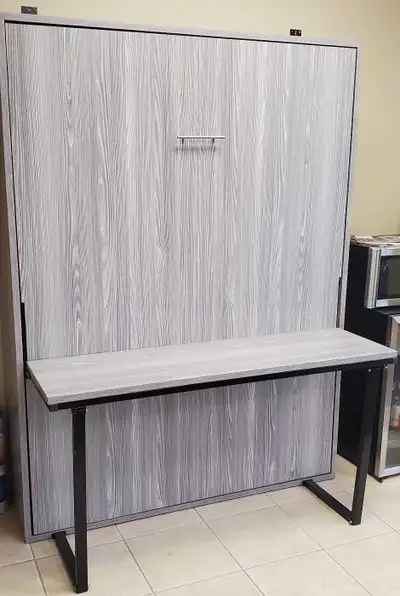 This is a brand new Murphy bed that can accommodate either a double or queen size mattress, perfect...