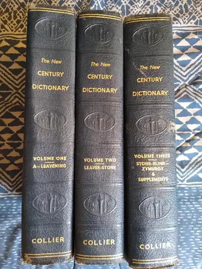 The New Century Dictionary printed in 1944. Three volume hardcover set that is in good condition but...
