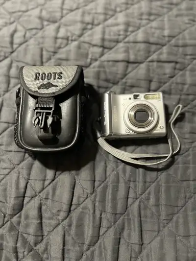 Canon PowerShot A520 4.0MP Digital Compact Camera 4x Zoom Silver, View more