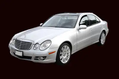 The car is finished in BRIGHT SILVER (775U) over a BLACK/ANTH LEATHER (821A) interior and power is p...