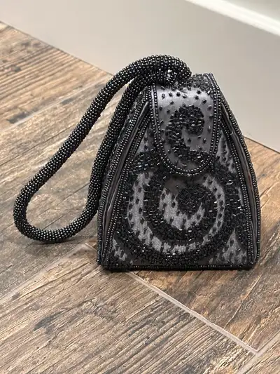Pick up in Cranston. Cute tiny beaded black hand handbag. Never used. Closet purge. Non-smoking hous...
