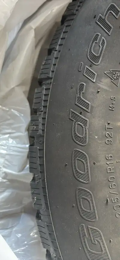 4 years old but hardly driven in the winter so tire tread is very good. Tire size will no longer fit...