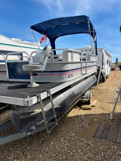 Pontoon boat and trailer with cover