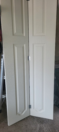 brand new Bifold Closet Doors 30×73