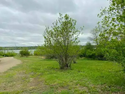 Premium lot located a block and a half from the beach/village office. Mostly flat and level, trees a...