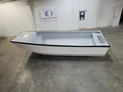Brand-new 22′ fiberglass skow-style hull, professionally built — perfect for a work skiff or commerc...