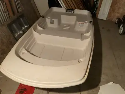 Row boat, able to handle a 5hp motor Sold by Canadian Tire 9ft 4inch Call Henry Rauter at 250-635-13...