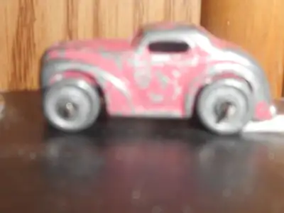 Vintage Barclay Slush Cast Coupe with metal wheels. Car is about 1.5" in length. All in vintage cond...