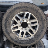 2011 Ford 18” Lariat 8x170 rims with studded winters