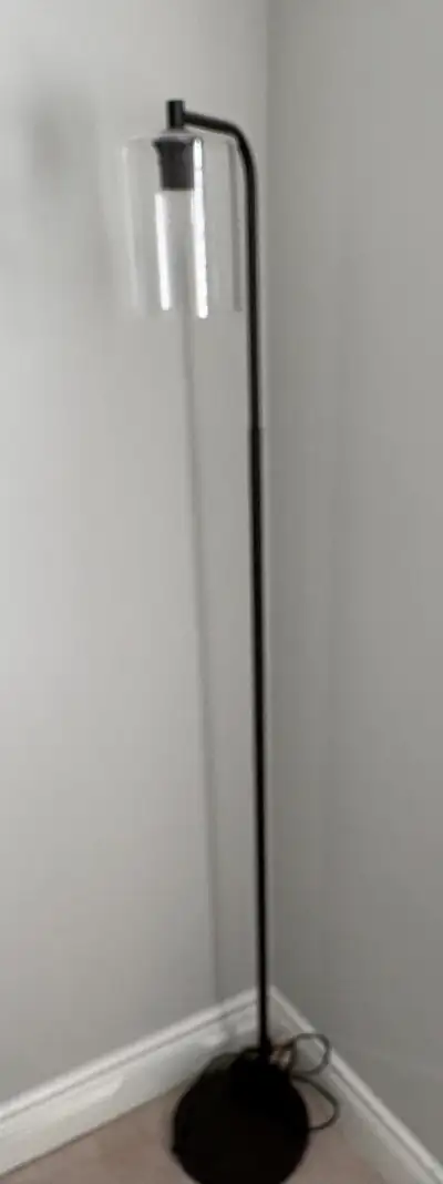 New modern floor lamp black metal frame and clear glass shade	, View more