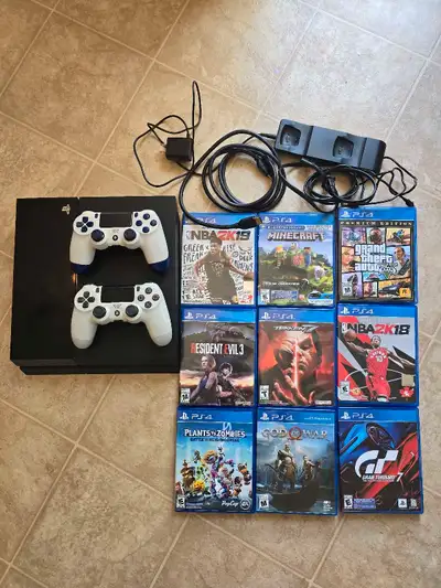  PS4 Bundle – 2 Controllers + Bunch of Games, View more