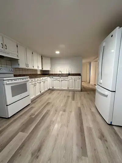Bottom right unit of a Fourplex. Nicely renovated with a very good sized backyard. The utilities are...