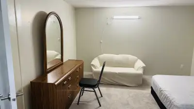 Large basement room available for rent near north west college . All bills are included