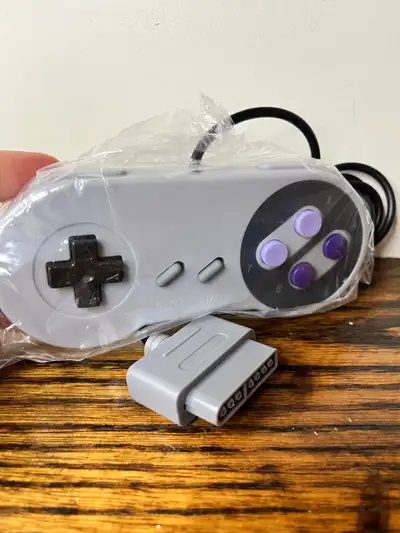 Relive the glory days of gaming with this new third party Super Nintendo replacement controller, off...