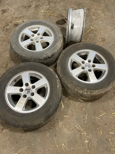 Dodge caravan rims 2 good tires only 1 summer and 4 rims Was going to use them on my new van but it...
