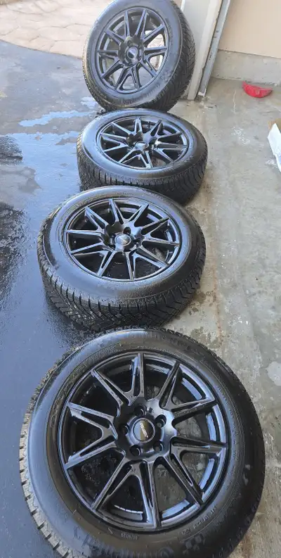 Selling 4 Fast Wheels Switch rims with Viking 8 225/60/17 winter tires on them. Used about 2 months...