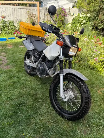 2023 Yamaha TW 200 with 2905 kms. Comes with upgraded front tire (and original) larger gas tank (ori...
