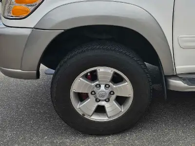 OEM Toyota Tires & Rims I upgraded my tires and rims so I'm selling an OEM Toyota Tacoma 6x139.7 mm...