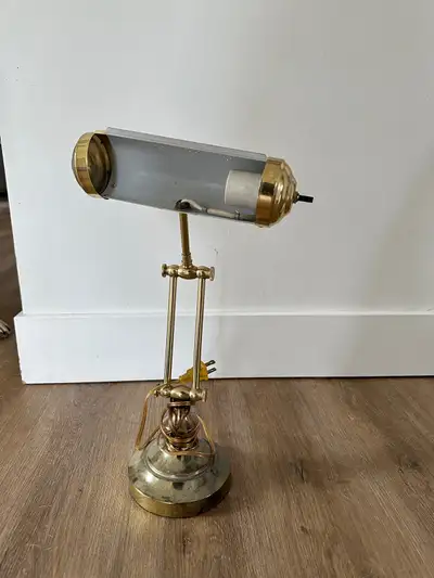 Small vintage brass bankers lamp Works well does not include bulb Dirt on base unsure if it will com...