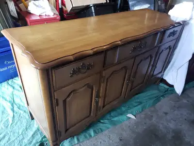 Beige cabinet with detailed handles, View more