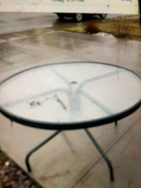 Patio round table. About 5 ft diameter