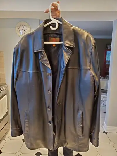 Danier leather coat with zippered lining that comes out . Worn 4 times