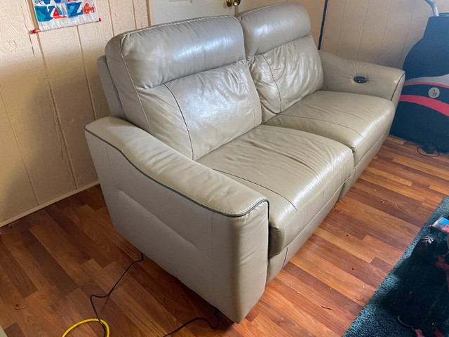 Grey leather loveseat with powered recline in Couches & Futons in Markham / York Region