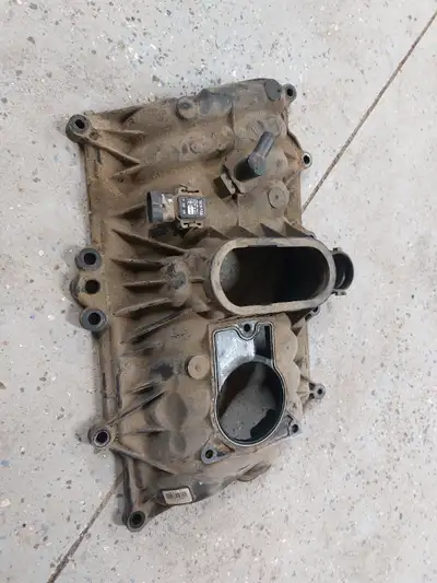 Good day, I have a factory plastic upper intake manifold for a 5.7L Vortec. Came off a 1997.