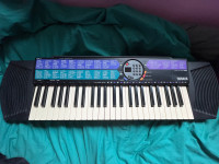 Yamaha PSR-77 Portable Keyboard Piano