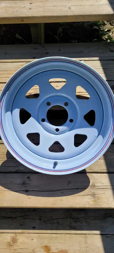 New Carlisle Trailer wheel,Size 15×6,excellent condition, 5 Bolt. Asking $50