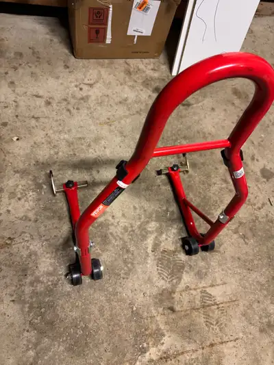 Vevor motorcycle stand. Can be used for front Or back. $60 firm Located in Barrie