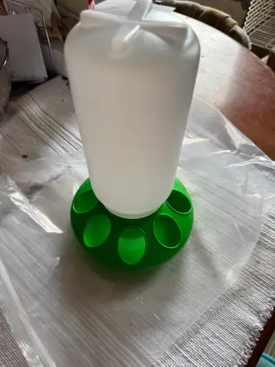 One brand new (unused) green bottom plastic chick feeder $10 Picture 1. Complete set of parts to mak...