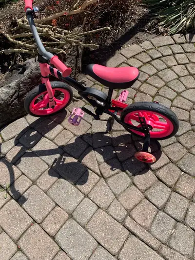 This is a Little Tikes child's bicycle that's perfect for learning to ride, featuring a sturdy frame...