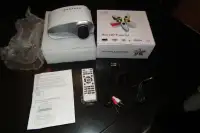 Mini L.E.D. Video Digital Projector ( new in Box )