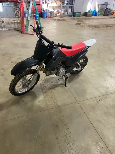 Looking to sell my 2014 Honda CRF110, a robust dirt bike perfect for young riders ready to hit the t...