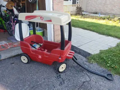 Step2 canopy wagon available for young children. Great for outdoor adventures, strolls, or backyard...
