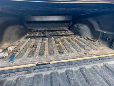Hard top and lockable truck bed cover. Rolls in on its self. Very easy to install. Just 4 brackets....