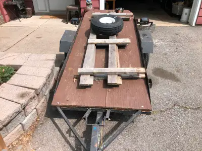 Smaller size utility trailer measures 3ft wide by 8ft long. All lights work, has detachable side rac...
