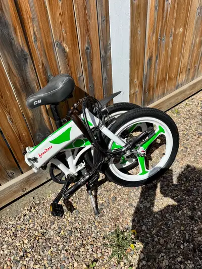 woman’s small ebike, View more