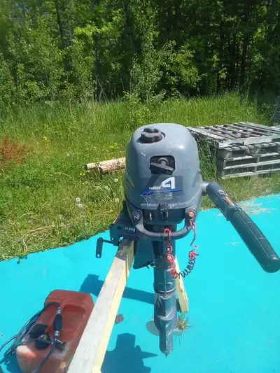 4 hp. Yamaha outboard in good running cond.,bought new around 2002,original owner,incl. Cruise a day