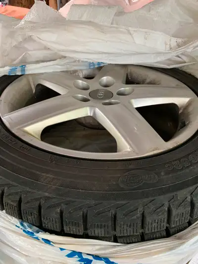 I have a set of Audi 4 rims and with tires for sale. See details in pictures. They have been in stor...