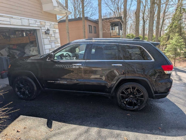2014 Jeep Grand Cherokee Impeccable Possibilité Échanges