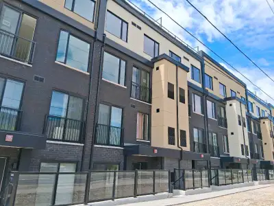 New Townhouse Condo 1 + Den For Rent  VP & Lawrence